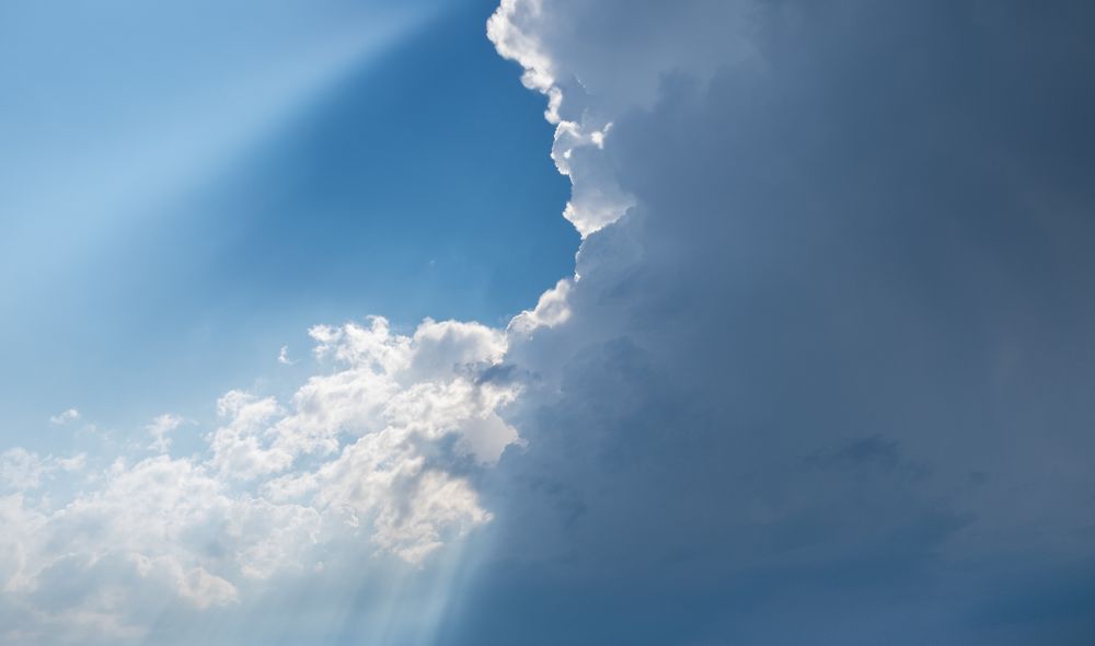 Bright clouds in a majestic blue sky