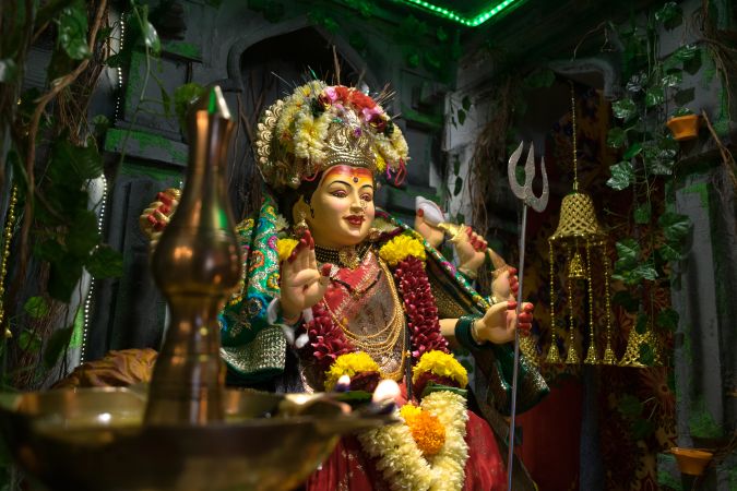 A beautiful idol of Maa Durga being worshipped at a pandal during Navratri in Mumbai, India
