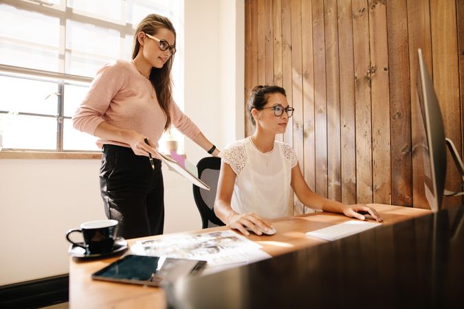 Creative business women at the office desk