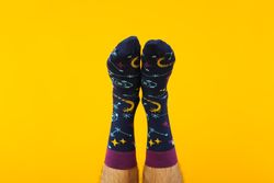 Concept of clothes for legs - socks, socks on male legs