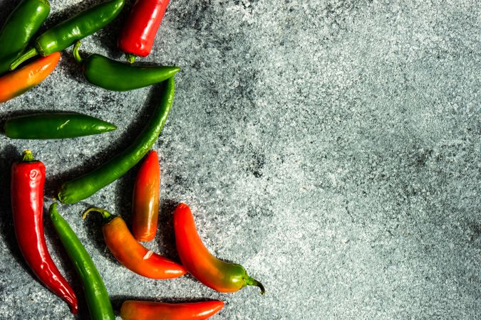 Spicy peppers on grey kitchen counter