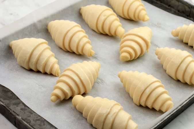 Ready to Bake Croissant on Baking Paper