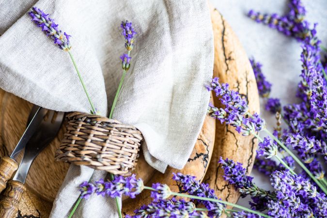 Close up of summer table setting with bunch of lavender flowers