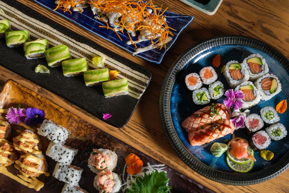 Assorted sushi served on trays