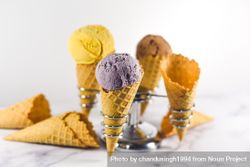 Ice cream cone holder with waffle cones and three different scoops 4NpjA0
