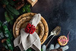 Christmas table setting with fern and dried orange slices