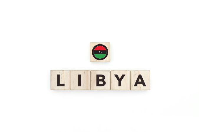 Wooden blocks bearing the name and flag of Libya.