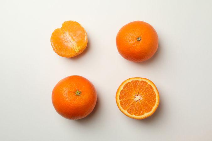 Flat lay with ripe mandarins on light background