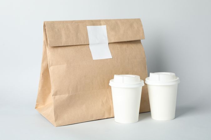 Food delivery mockup on light gray background, space for text
