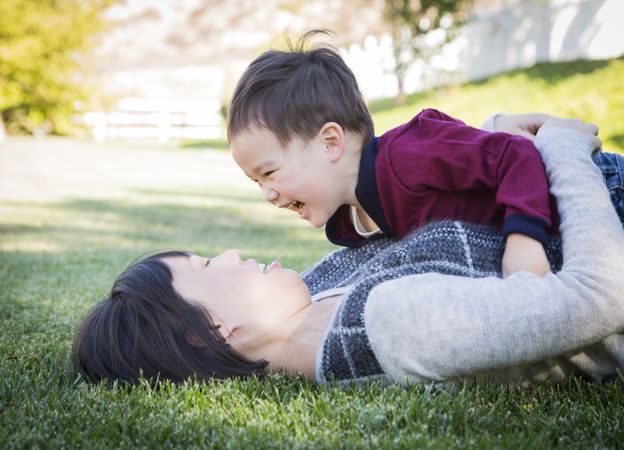 Chinese Mother Having Fun with Her Baby