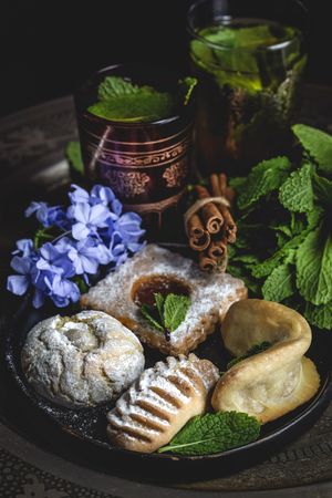 Traditional tea with mint and assorted Arab sweets