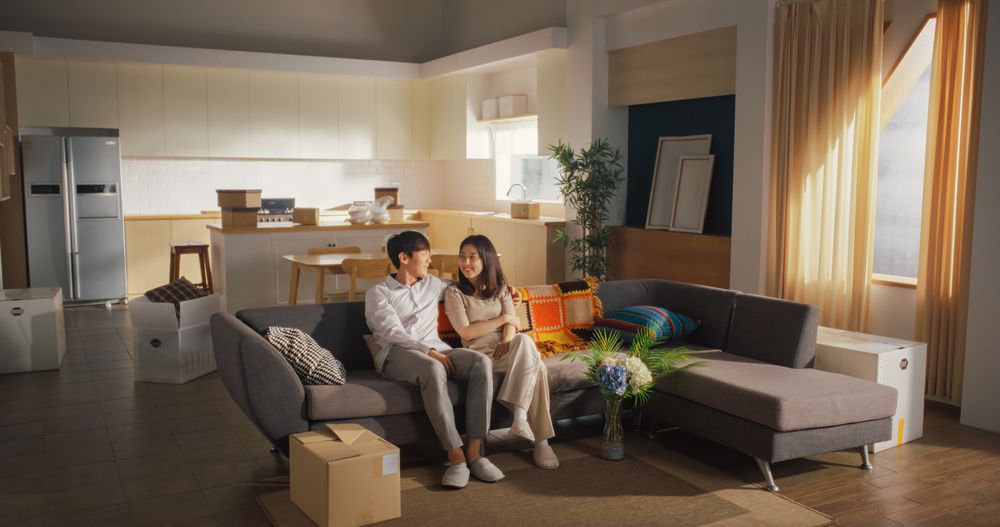 Family Home Moving in: Happy and Excited Young Korean Couple Enter Newly Purchased Apartment.
