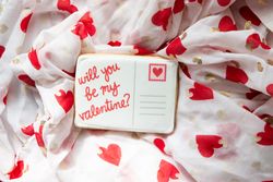 Valentine's Day theme with a love message. Flat lay