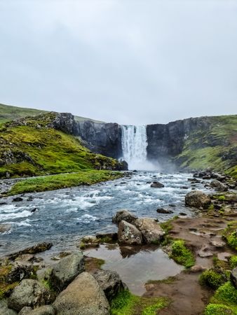 Majestic icelandic waterfall cascading over cliffs