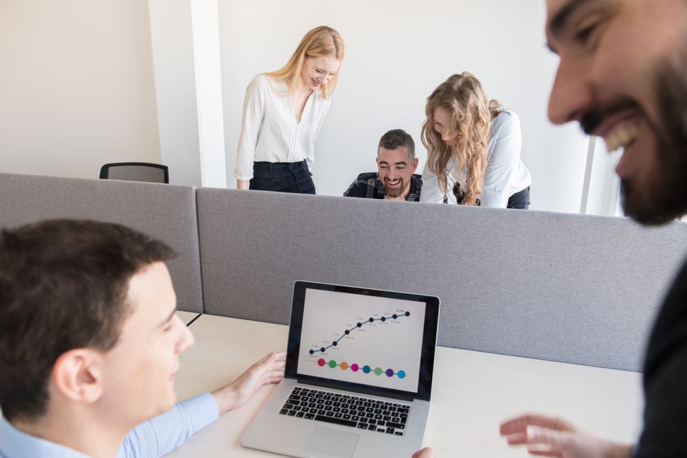 Group of colleagues working in contemporary office