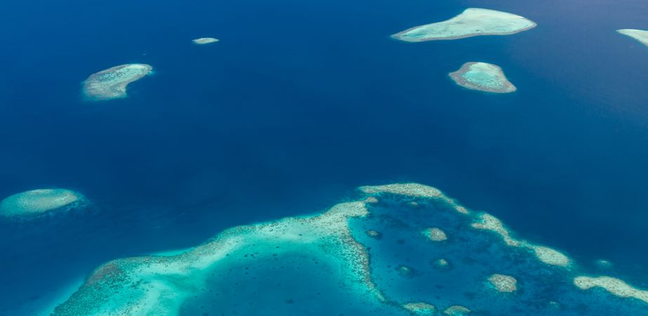 Picture of small islands in clear blue water, wide