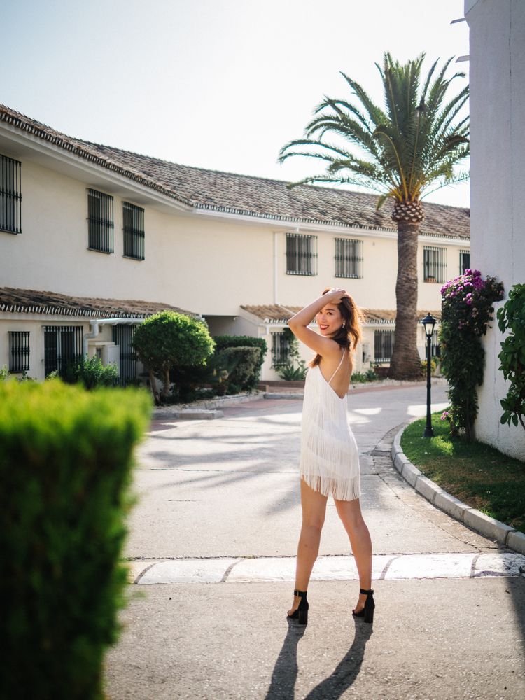 Young elegant Asian woman at a luxurious resort
