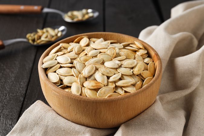 Cooking ingredients for fall season - pumpkin seeds, pumpkin