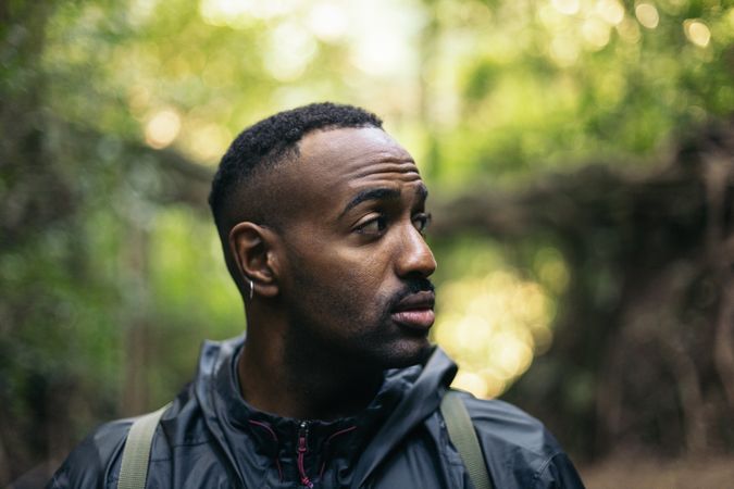 Man looking away in the jungle