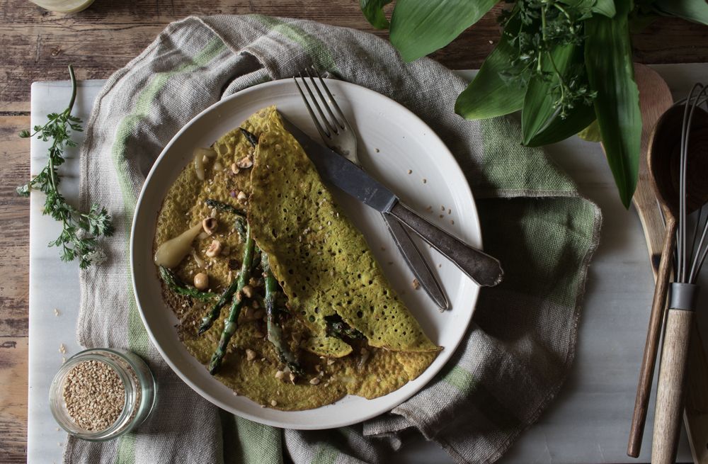 Served vegetarian crepe with oats and asparagus