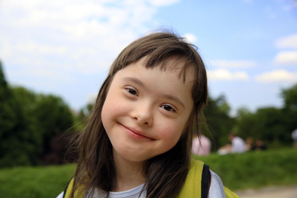 Close up of beautiful child smiling at camera