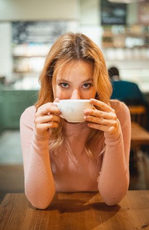 Woman having a cup of coffee