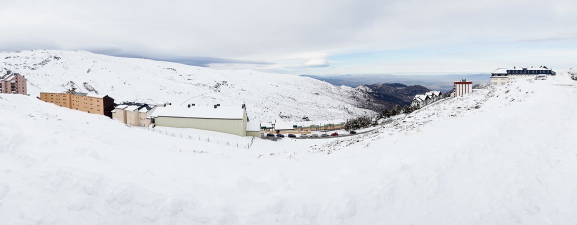 Panoramic view of ski resort of Sierra Nevada full of snow
