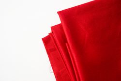 Silky Red Fabric Background Texture.