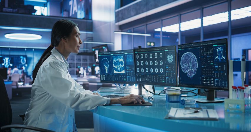 Hospital Research Laboratory: Asian Female Medical Scientist Using Computer Green Screen Chromakey On Displays.