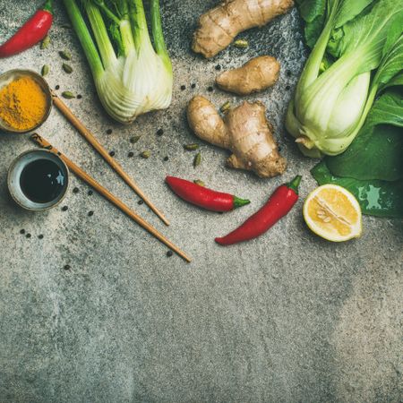 Asian cuisine ingredients over concrete background