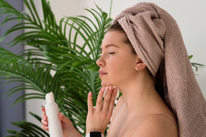Skincare routine with toner and cotton pad