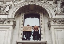 London, England, United Kingdom - June 6th, 2020: Two protesters standing in arch