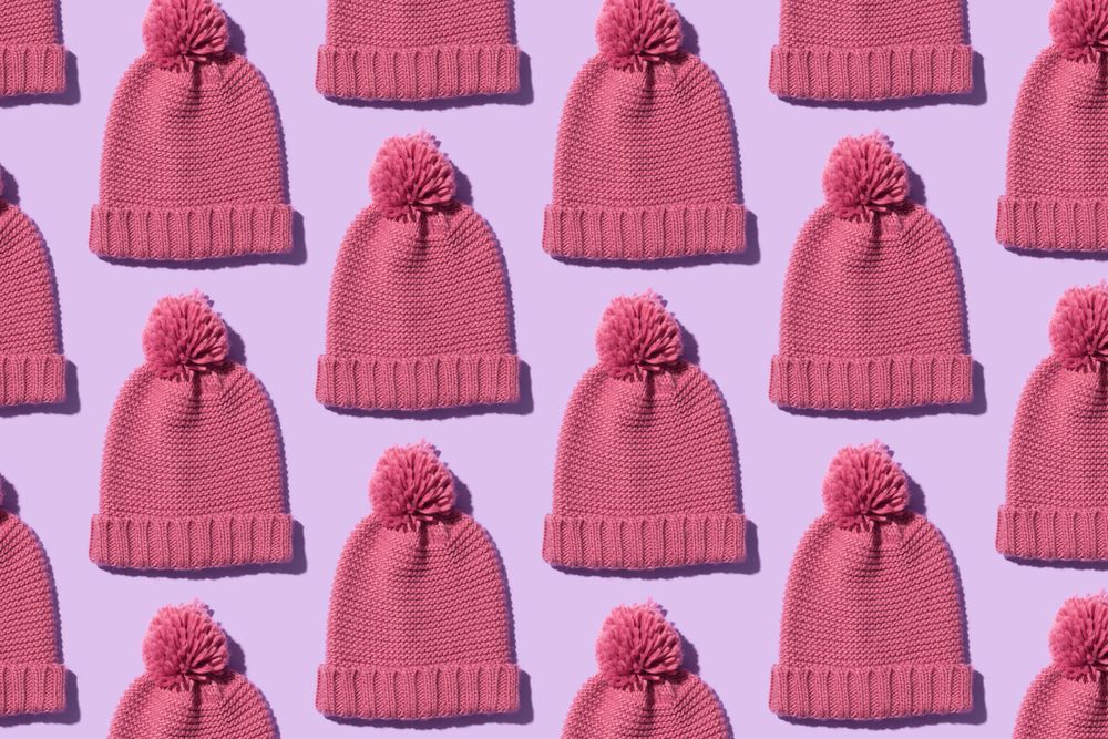 Beanies on pink background