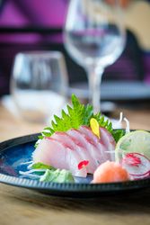 Japanese amberjack sashimi dish in restaurant