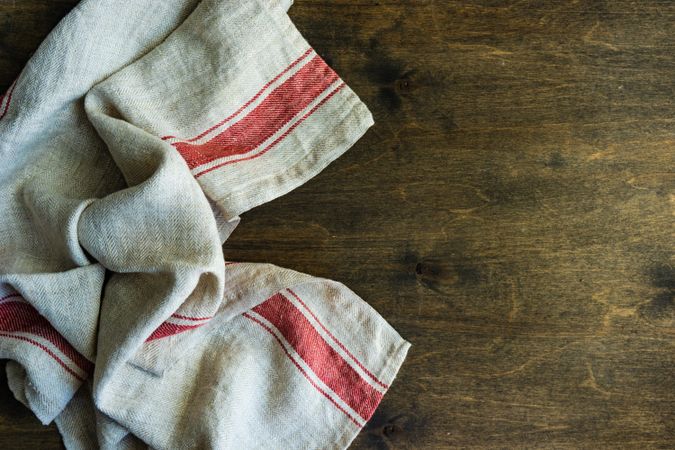 Kitchen towel or napkin over the rustic wooden table