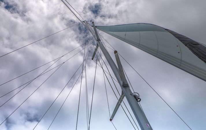 Shot looking up at the sky and sail mast
