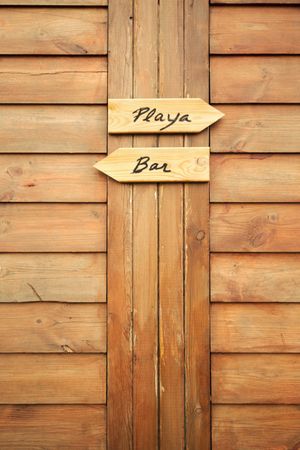 Wooden sign for the beach