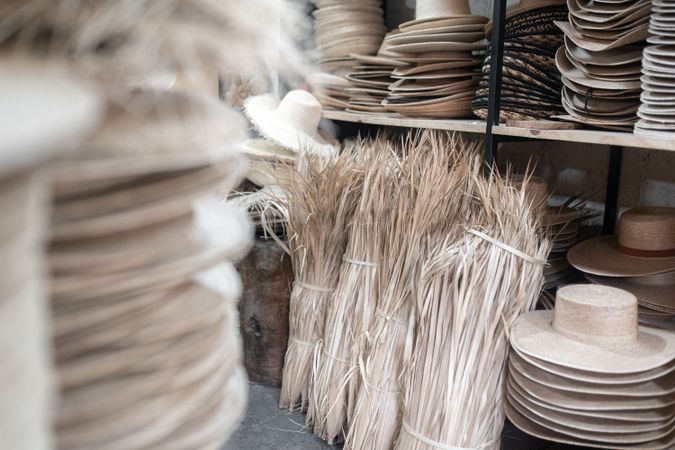 Some palm tree fiber stacks in a hat workshop