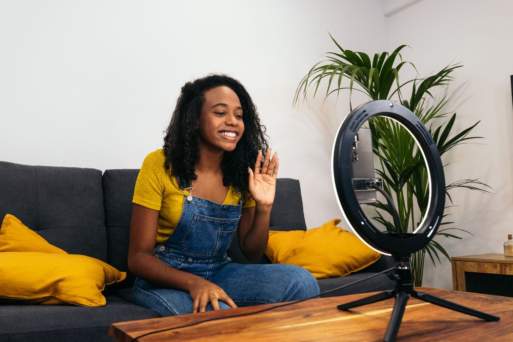 Young woman creates content with phone