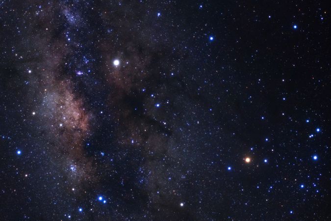 Milky way galaxy with stars and space dust in the universe, Long exposure photograph, with grain.