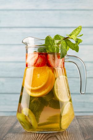 Water flavored with fresh summer fruit.
