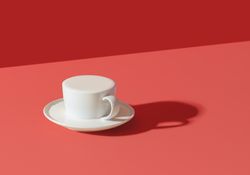 Milk cup isolated on a pink background