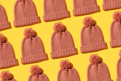 Beanies on orange background