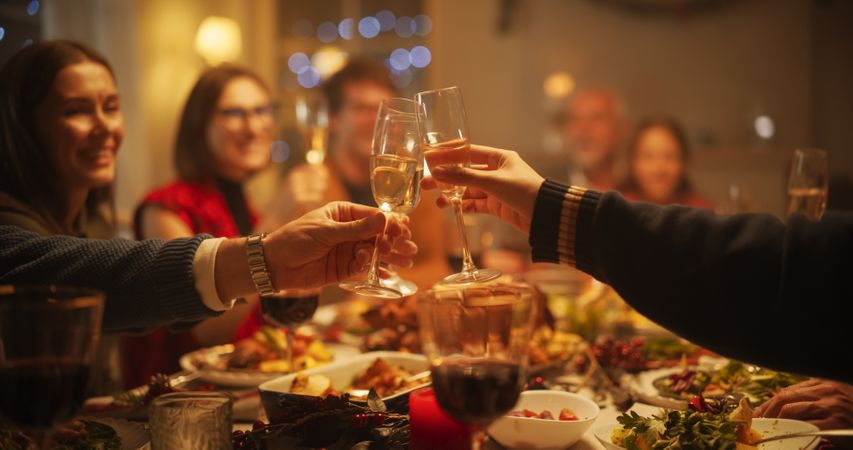 Family, Children and Friends Spend Christmas Dinner Together at Home in the Afternoon.