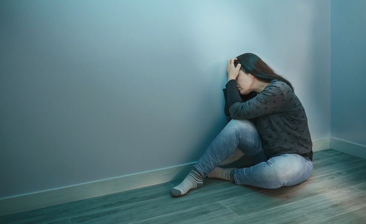 Unrecognizable woman with hands in head