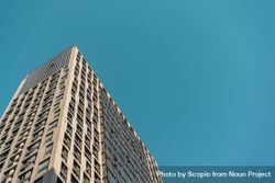 Gray concrete building under blue sky 48n2Y0