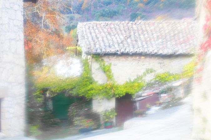 Blurred narrow street in village