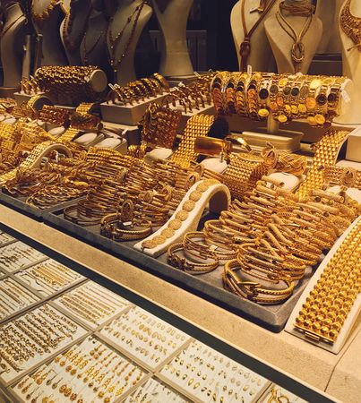 Gold jewelry on display in shop window