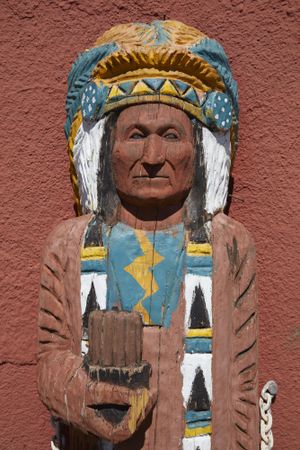 Native American wooden figure on the streets in Roswell NM