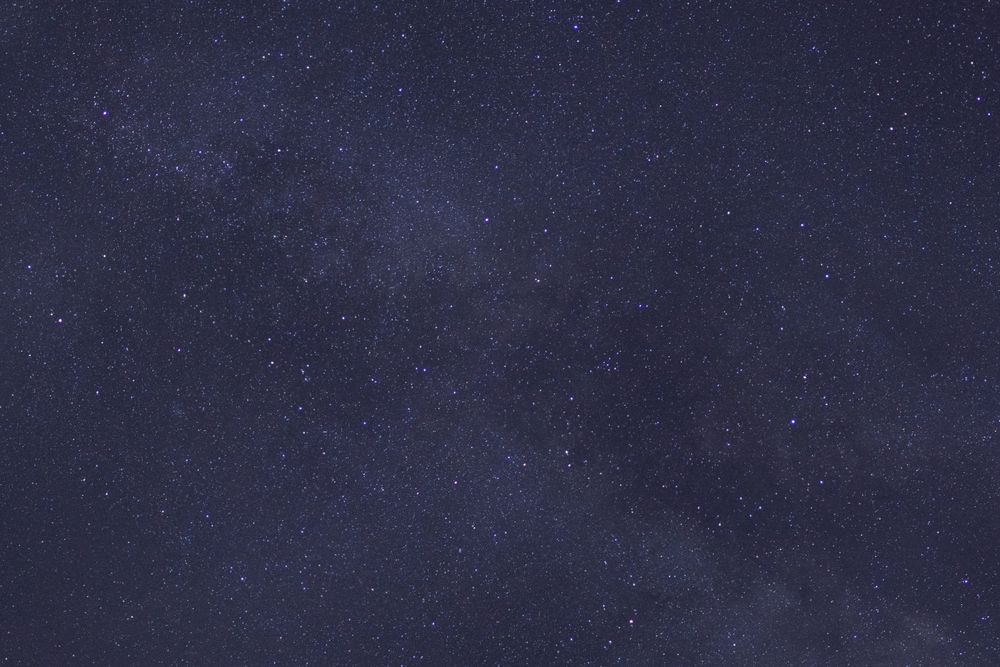 Starry night sky and milky way galaxy with stars and space dust in the universe